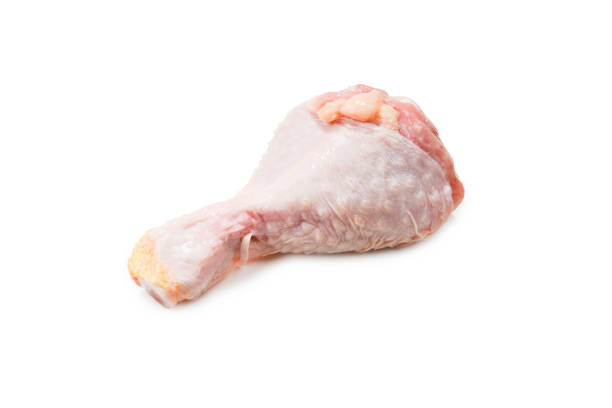 istock Tasty raw chicken legs. Top view. Isolated on white 1166010656