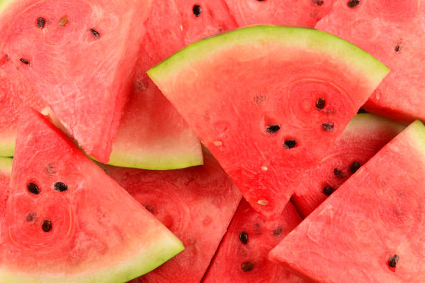 istock Juicy watermelon slices background. Top view. 1166010675