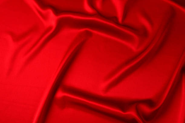 istock Red silk or satin luxury fabric texture can use as abstract background. Top view 1166010679
