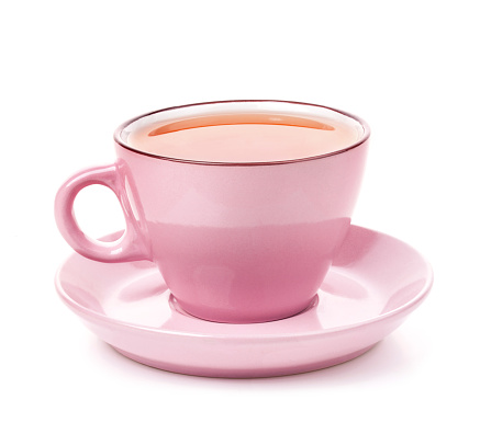 Pink cup of tea isolated on white background