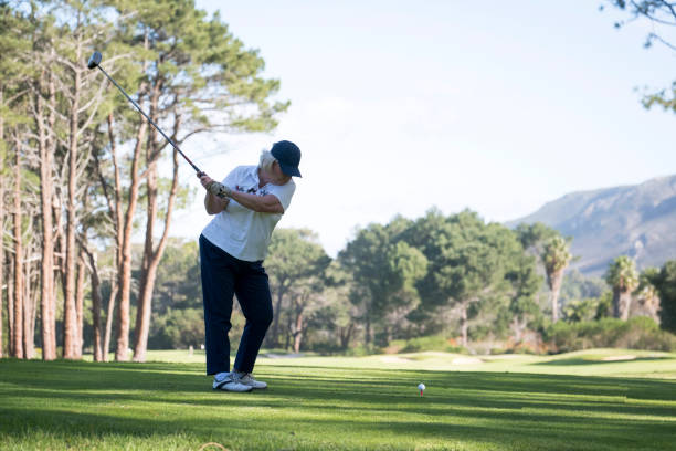 istock Big tee shot by a senior woman at course 1166013807