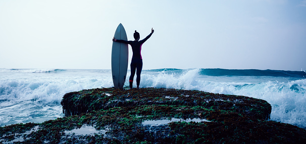 November 24, 2023. Waimea, Hawaii. Surfers bravely ride the big waves at Waimea.