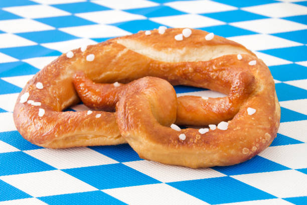 istock German Pretzel and Bavarian background 1166019044