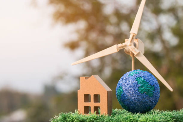 istock Future Alternative energy / Green Clean electric energy from renewable sources wind turbines for home and save earth. Idea on sustainable eco residential family house,use ecology renewable 1166019993