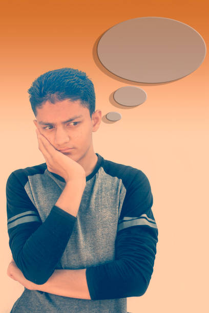 istock Portrait of a White Caucasian isolated on a gradient expressing thinking and thoughts on his face and a conversation bubble chat icon arising. 1166021273