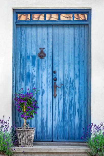 istock Front door with flower garden in Sweden 1166023502