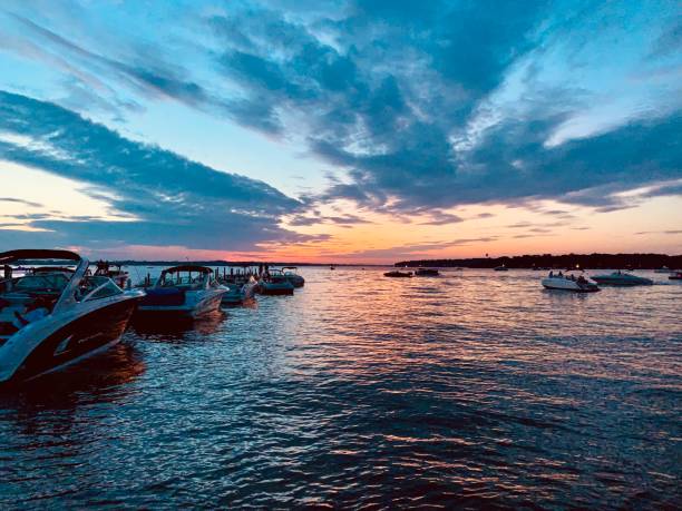 Evening Sunset at the Lake Summer Sunset along the shoreline lake okoboji stock pictures, royalty-free photos & images