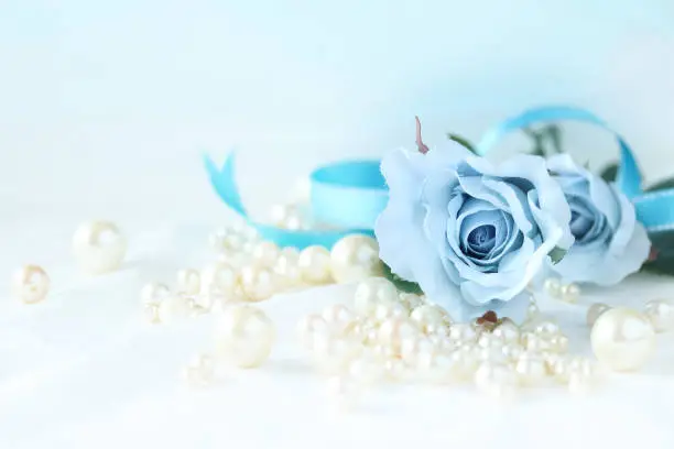 Photo of Blue rose and pearl