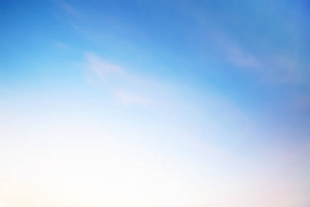 istock Cloud sky sunrise during morning background. Blue pastel heaven,soft focus lens flare sunlight. Abstract blurred white cyan gradient of peaceful nature. Open view windows beautiful summer spring 1166026710