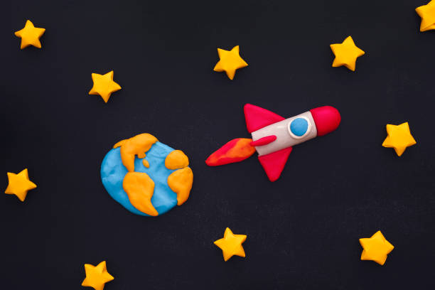 istock Space Rocket Flying Through The Stars On Blackboard 1166027819