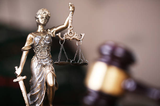 istock Law concept, sculpture and gavel 1166032950