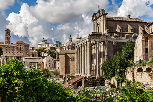 Rome, Italy, October, 7, 2018: View of the part of the Roman forum with the Temple of Antoninus and Faustina adapted to church of San Lorenzo in Miranda.