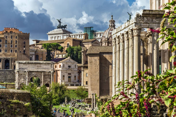 Part of the Roman forum. Rome, Italy, October, 7, 2018: View of the part of the Roman forum with the Temple of Antoninus and Faustina, the Triumphal Arch of Septimius Severus, Rostra. san lorenzo rome photos stock pictures, royalty-free photos & images