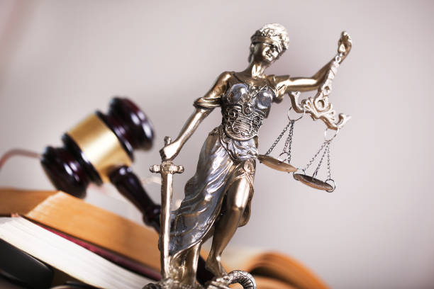 istock Law concept, sculpture and gavel 1166033332