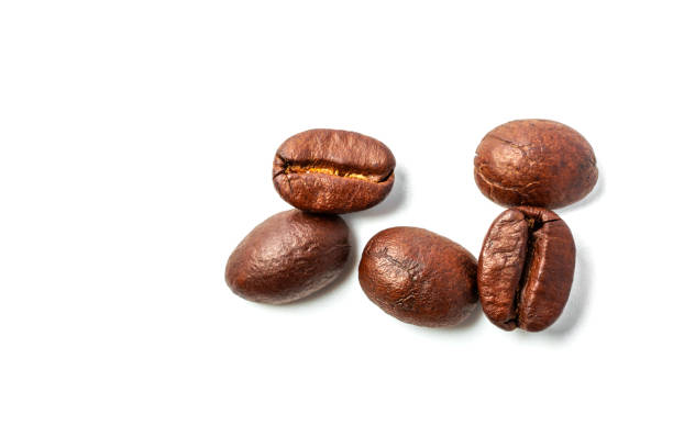 istock A spread coffee beans isolated on white background and copy space 1166035834