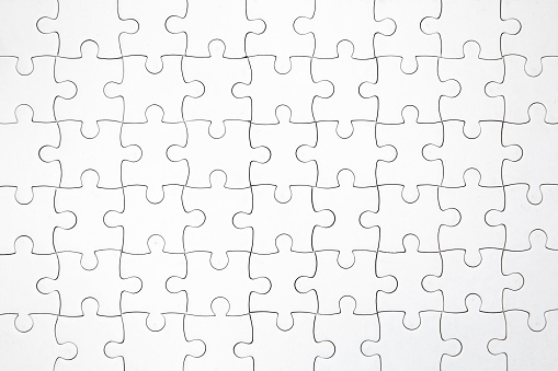 top view shot of white jigsaw puzzel background