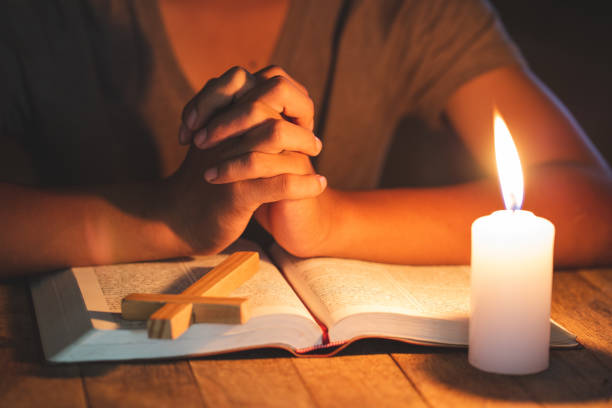 istock Praying Hands. Eucharist Therapy Bless God Helping Repent Catholic Easter Lent Mind Pray. Christian Religion concept background. 1166039688