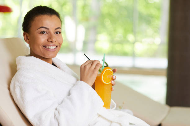 istock Smiling Woman Relaxing in Spa 1166039759