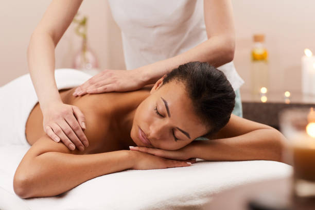 istock Blissful Woman Enjoying Massage 1166039762