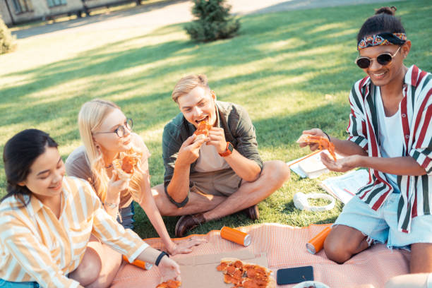 istock Friends telling funny stories during their picnic. 1166042758