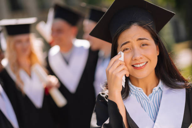 Graduation Pain 200+ Crying Graduation Stock Photos, Pictures & Royalty-Free Images ...