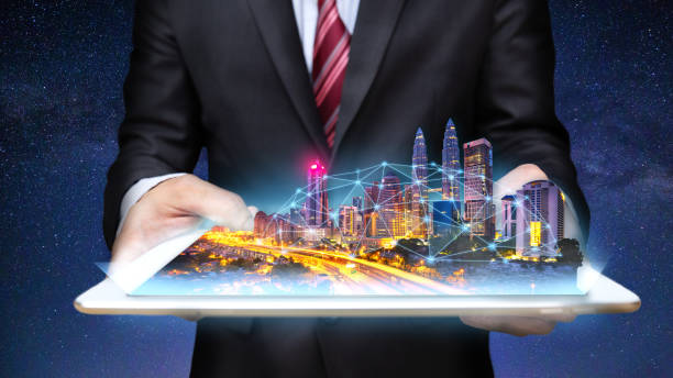 istock Smart city with business man and tablet 1166044060