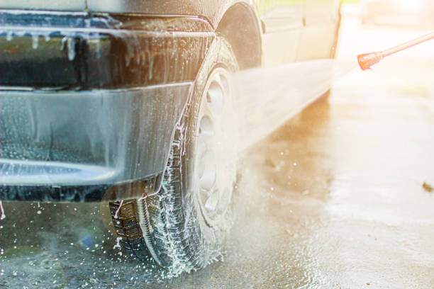 istock Modern car wash, dripping water and foam. 1166047829