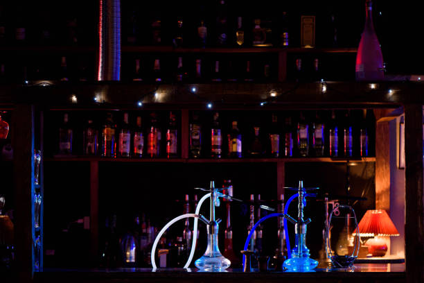 istock Group of eastern hookahs on table of a bar. 1166048428