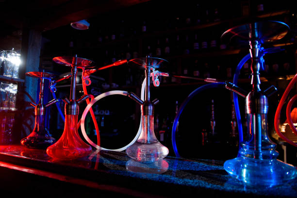 istock Group of eastern hookahs on table of a bar. 1166048479