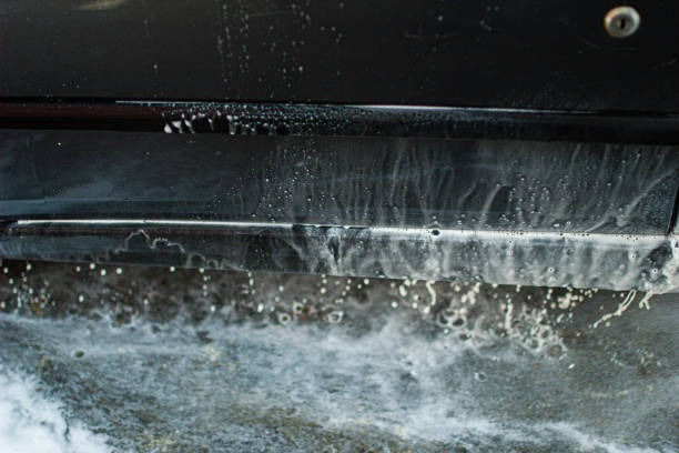 istock Modern car wash, dripping water and foam. 1166049492