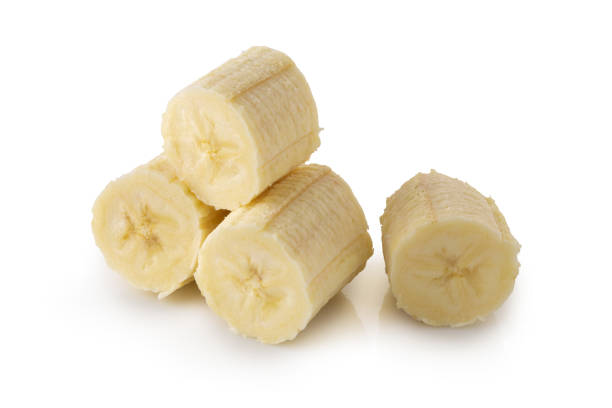 istock Peeled banana slices isolated over a white background. 1166049604