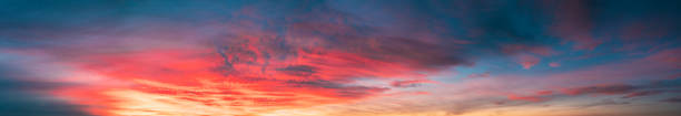 istock Sunrise Sky Cloudscape. Natural Bright Dramatic Sky In Sunset Dawn. Yellow, Blue And Orange Sky Colors Above Dark Ground. 1166054840