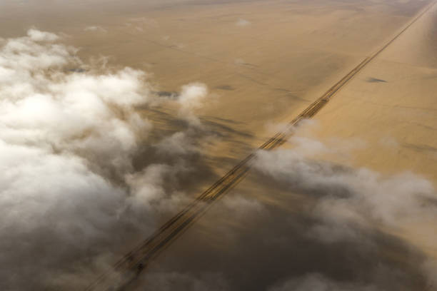 Coastal fog rolling over the desert landscape of Skeleton coast. Skeleton coast, Namibia.