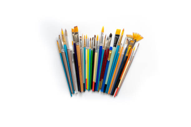 istock Colorful cosmetic brushes close up on white background 1166063765