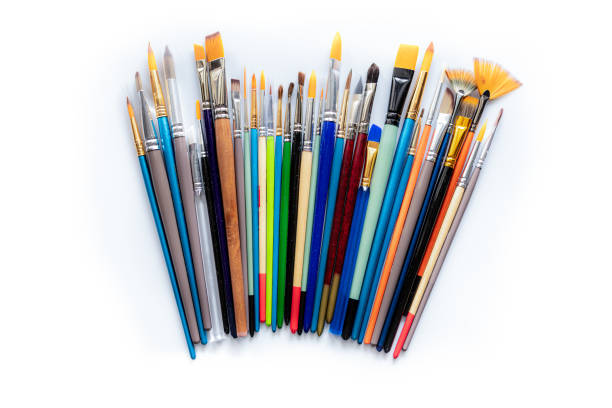 istock Colorful cosmetic brushes close up on white background 1166063843