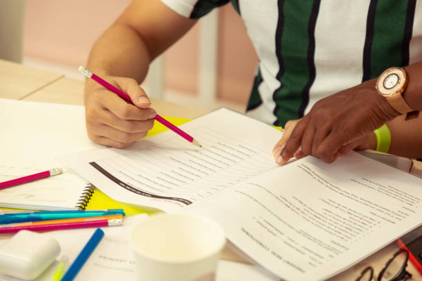 istock Close up of female hand that pointing at task 1166071055