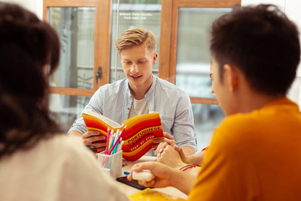 istock Group of young people waiting for their teacher 1166071105
