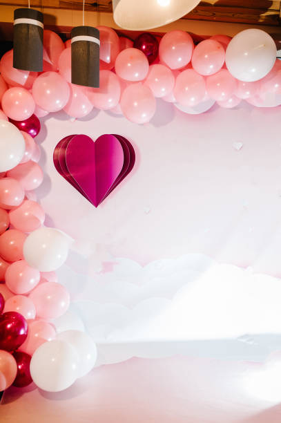 photo-wall, wedding decoration space or place from white and pink balloons and white wall with a wedding heart. concept of happy birthday and valentine's day. - personal accessory balloon beauty birthday imagens e fotografias de stock