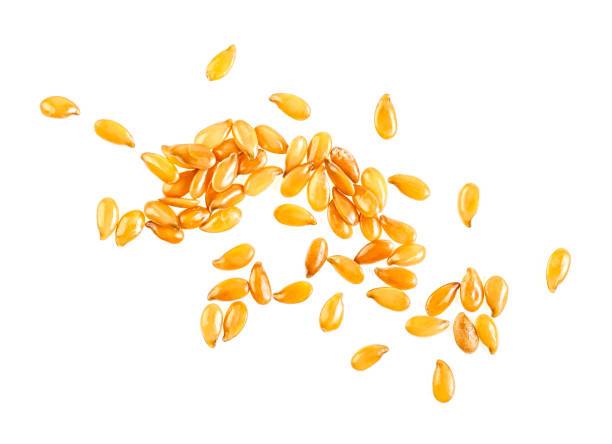 istock Yellow flax seeds on a white background. Top view. 1166076204