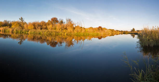 istock River Ros autumn panorama, Ukraine 1166078859