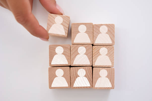 istock Businessperson's Hand Holding Cubic Block 1166079159