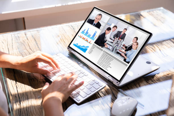 Businesswoman using laptop for video conferencing