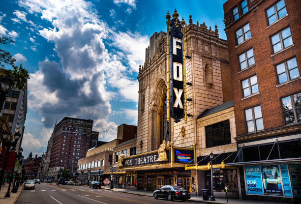Neon sign hangs on the main entrance of the Fabulous Fox a 1920 siamese byzantine style movie theater restored in 1982 as an off broadway venue. stock photo