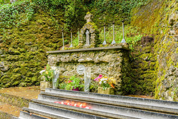 Altar with candles and crosses at the Tobarnalt Holy Well, County Sligo, Ireland