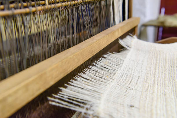 Linen being woven on a loom in Ireland.
