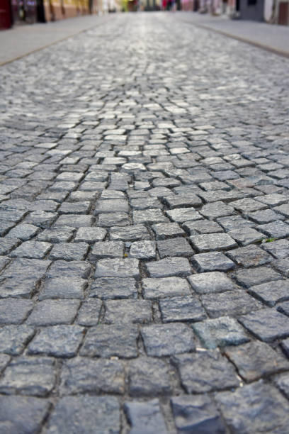 istock Texture of old stone street 1166088768