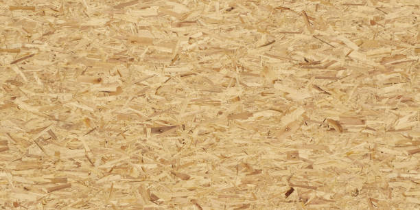 image de plein cadre du panneau orienté de brin (osb). texture transparente haute résolution - particleboard photos et images de collection