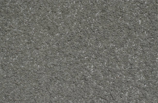 istock Full frame image of cement or concrete exterior wall surface. High resolution seamless texture 1166090624