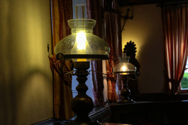 istock A beautiful table lamp stands in a room 1166091472