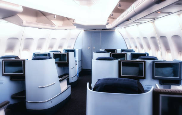 istock Airplane cabin business class interior view 1166093470